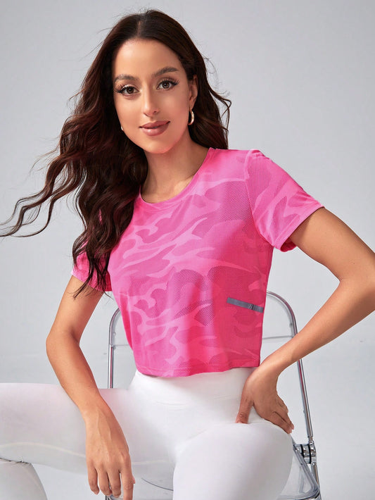 SHEIN Sport Studio Camiseta deportiva crop con estampado de camuflaje