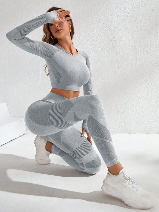 SHEIN Yoga Basic Conjunto deportivo inconsútil con estiramiento alto agujeros de pulgar con estampado de rayas
