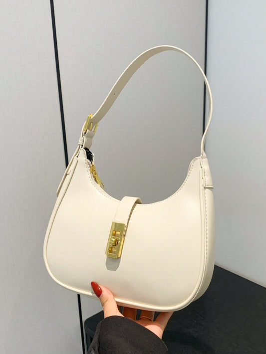 Bolso de hombro con textura en forma de creciente y un solo color para mujeres, bolso clásico y minimalista con decoración de candado, adecuado para uso diario y citas
