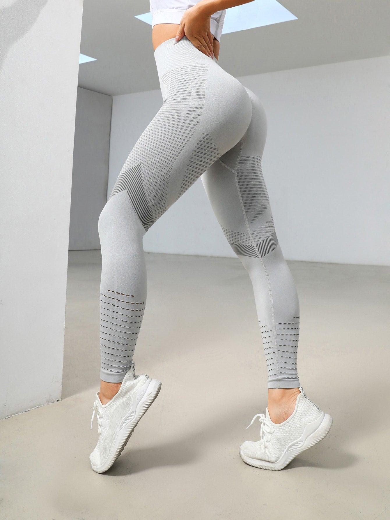 Leggings deportivos control de barriga con abertura