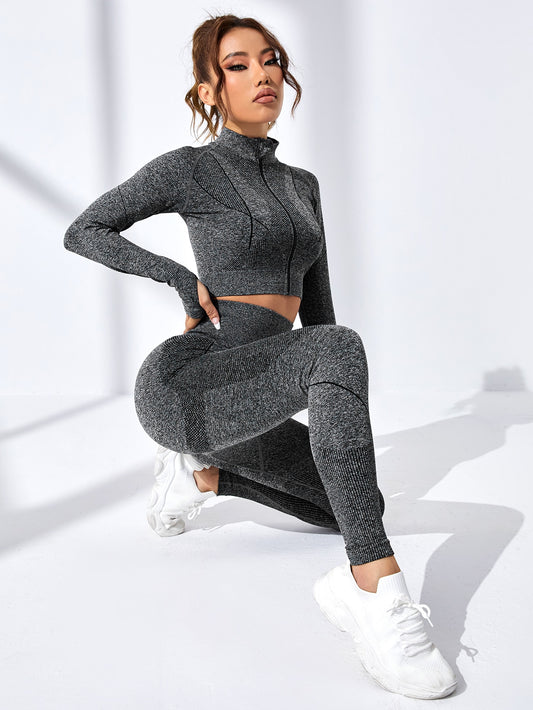 Conjunto deportivo inconsútil agujeros para pulgares con puntada cremallera